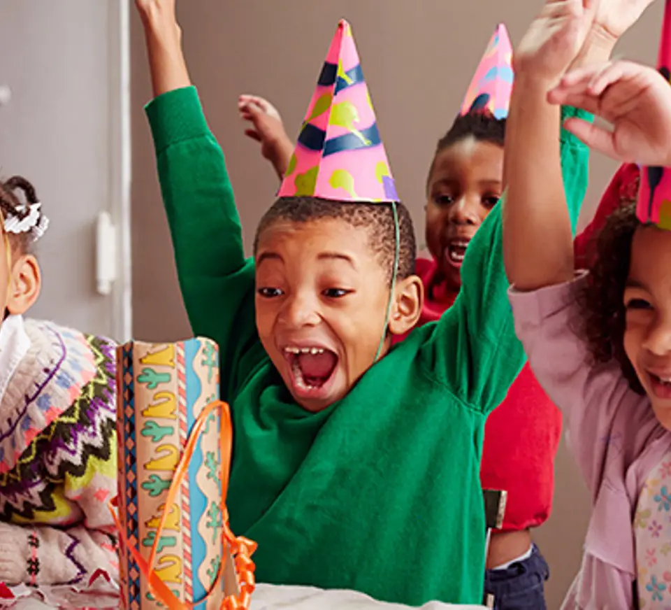 Kids Celebrating Party with Party Hats